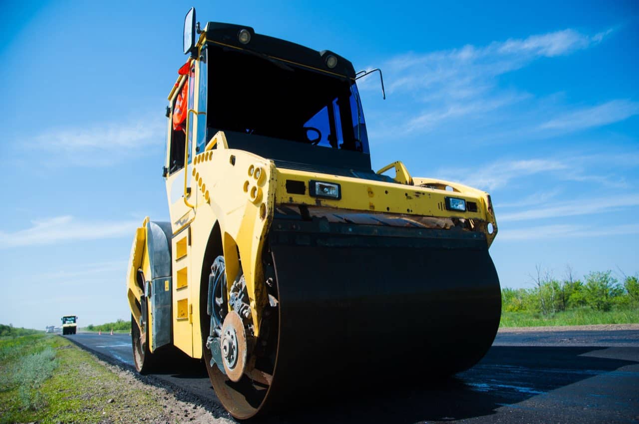 Fresh asphalt being paved in Massachusetts
